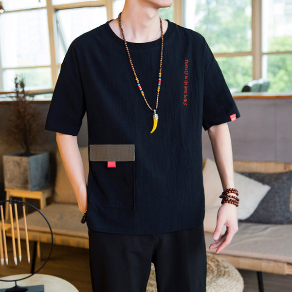 Camisa de algodón y lino para hombres con cuello redondo y bolsillo suelto.