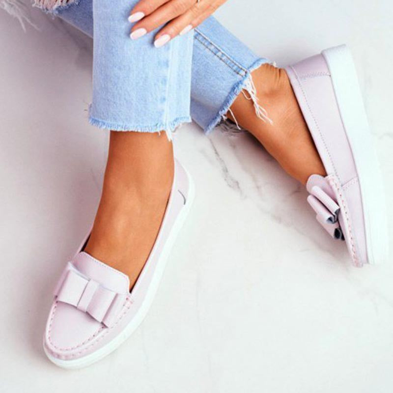 Zapatos casuales con suelas suaves y tacones planos para mujeres durante toda la temporada.