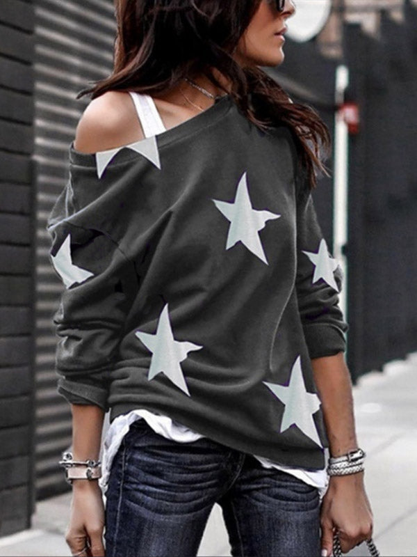 Moda femenina con un suéter de cuello redondo pentagonal con estampado de estrellas