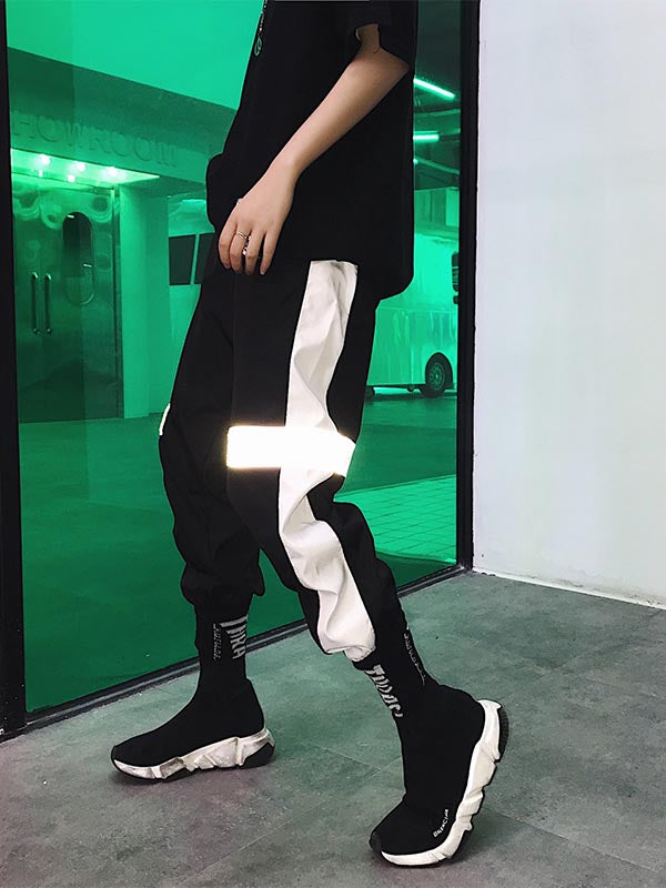 Pantalones hip-hop para hombre con efecto reflectante.