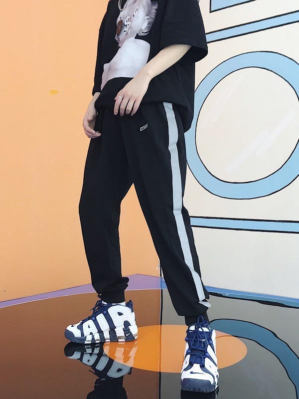 Pantalones hip-hop para hombre con efecto reflectante.