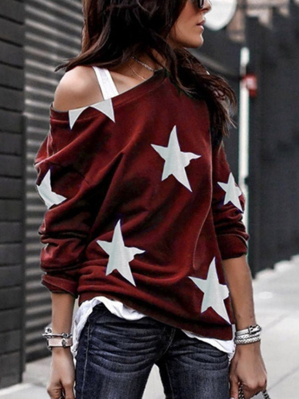 Moda femenina con un suéter de cuello redondo pentagonal con estampado de estrellas