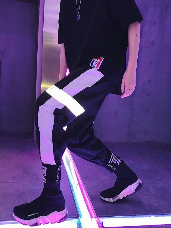 Pantalones hip-hop para hombre con efecto reflectante.