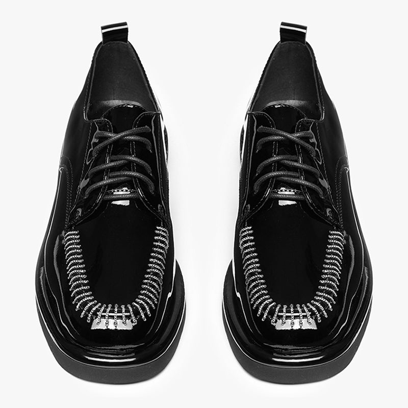 Patent Oxfords in Schwarz / Braun