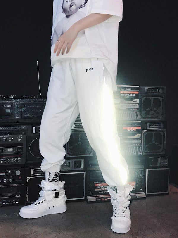 Pantalones hip-hop para hombre con efecto reflectante.