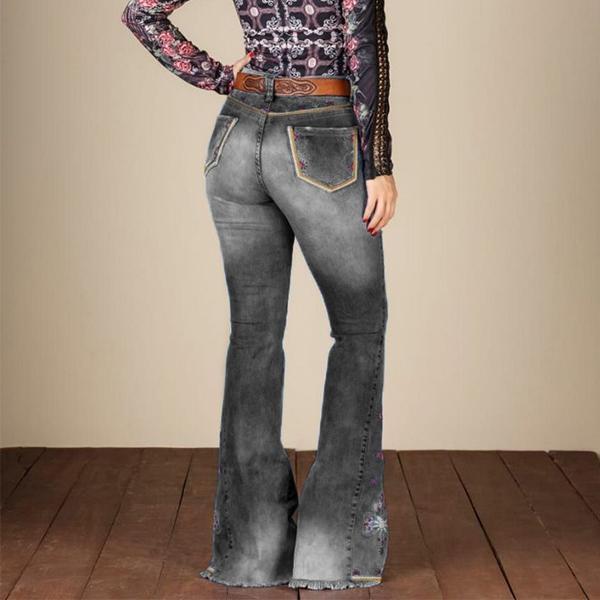 Jeans acampanados elásticos bordados, rotos, lavados y lavados