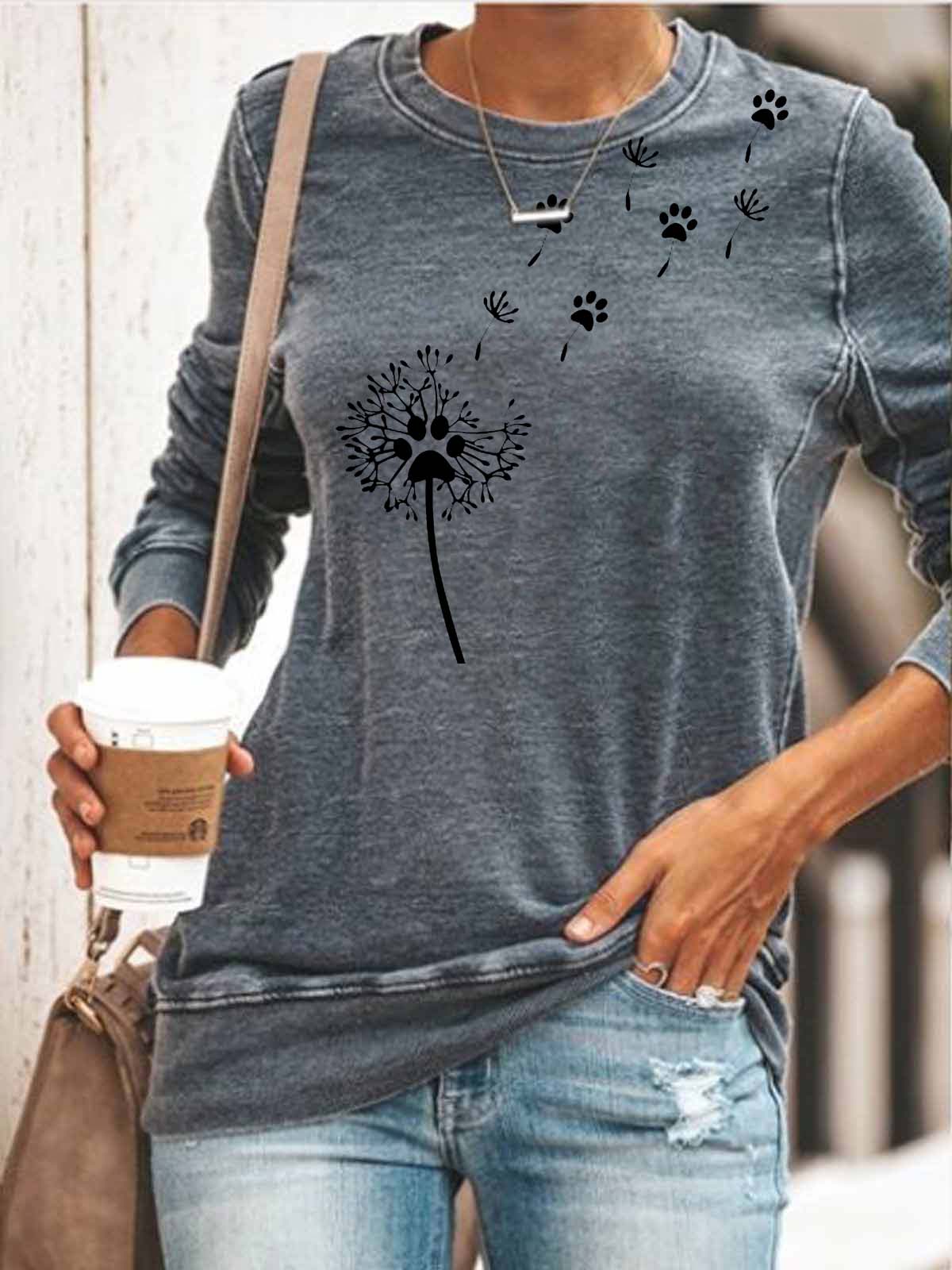 Kūrybingo dizaino viršus su kiaulpienės letena